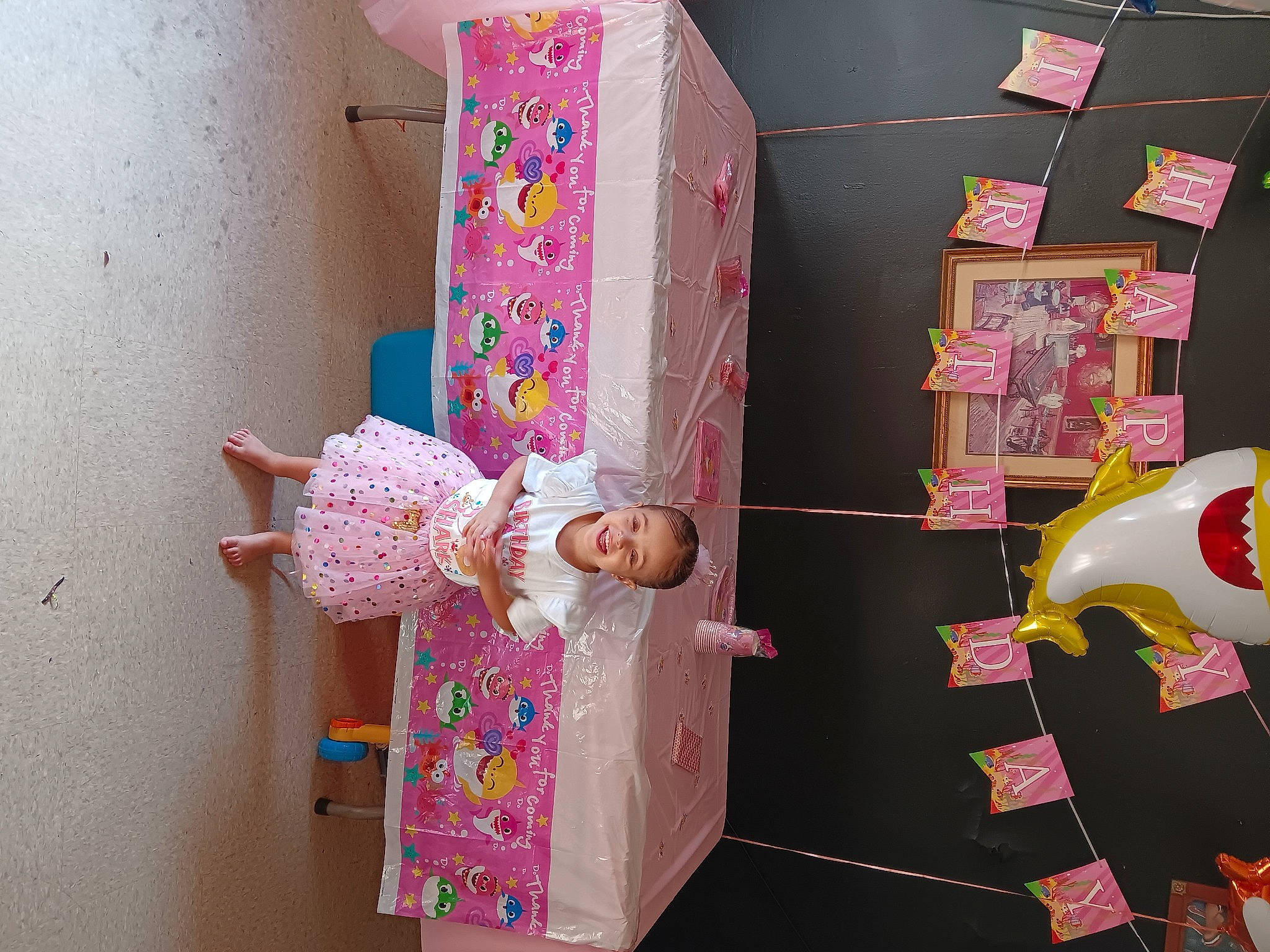 Myla is registered to the contest to win money with this photo: art, baby_products, baby_toddler_clothing, baby_toys, cardboard, child, fun, joy, magenta, paper, paper_product, pattern, person, pink, plastic, play, room, shelf, textile, toddler