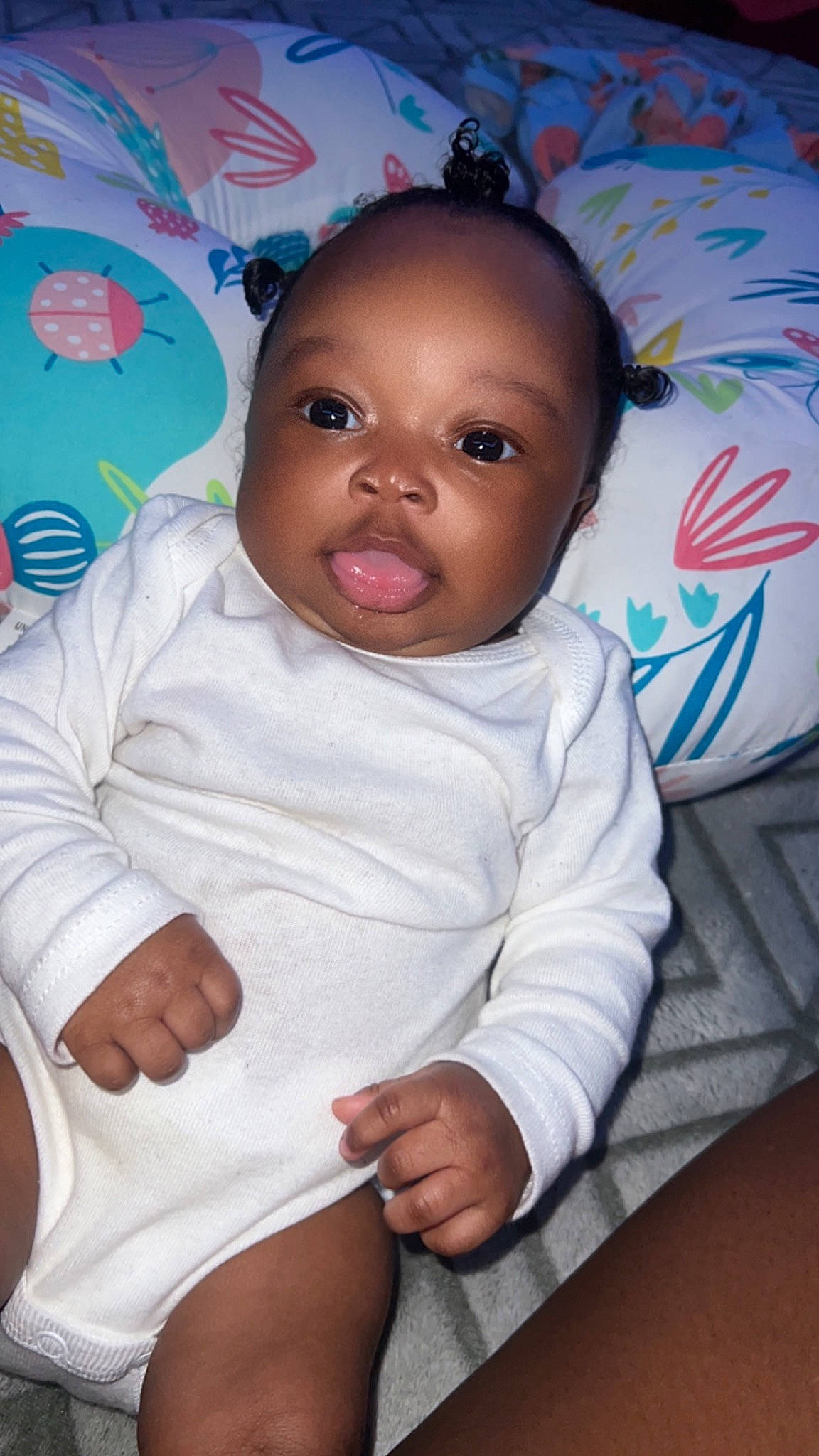 A'Mora joined the competition — help win amazing prizes! arm, baby, baby_toddler_clothing, cheek, child, chin, comfort, eye, finger, gesture, happy, head, iris, lip, mouth, nose, person, pink, skin, sleeve