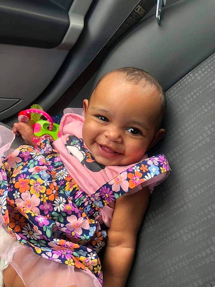 Marshaila joined the competition — help win amazing prizes! arm, baby, baby_toddler_clothing, black_hair, car_seat, chin, dress, flash_photography, happy, human_body, iris, joy, lip, mouth, nail, person, pink, skin, smile, thigh