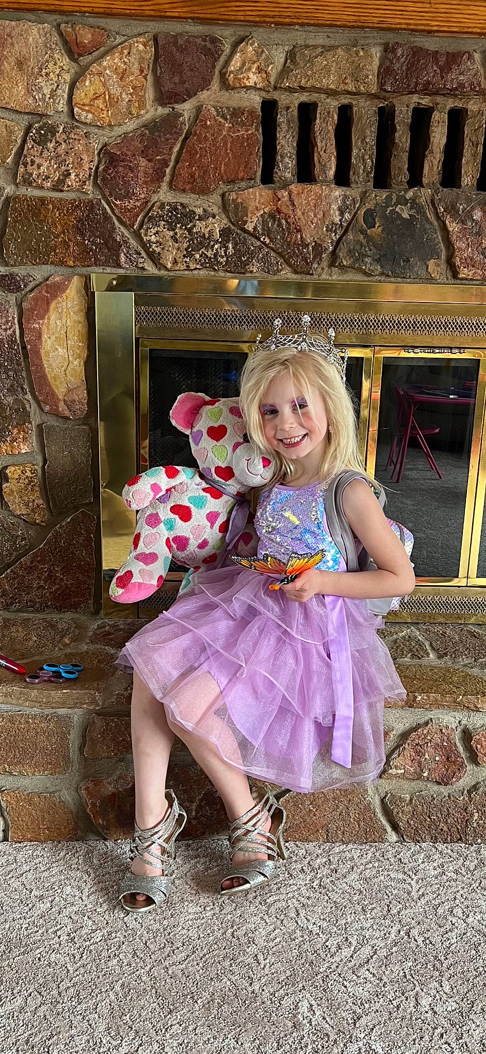 Kimber joined the competition — help win amazing prizes! baby_toddler_clothing, blond, clothing, dress, event, fashion, fashion_design, fawn, fun, happy, head, headpiece, joy, magenta, pattern, person, picture_frame, pink, sitting, smile