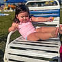 blue_sky, child, clouds, daytime, grass, happy, leisure, outdoor, person, pink, playing, pool_chair, relaxing, snack, summer, sunny, swimsuit, toddler, vacation, water_park