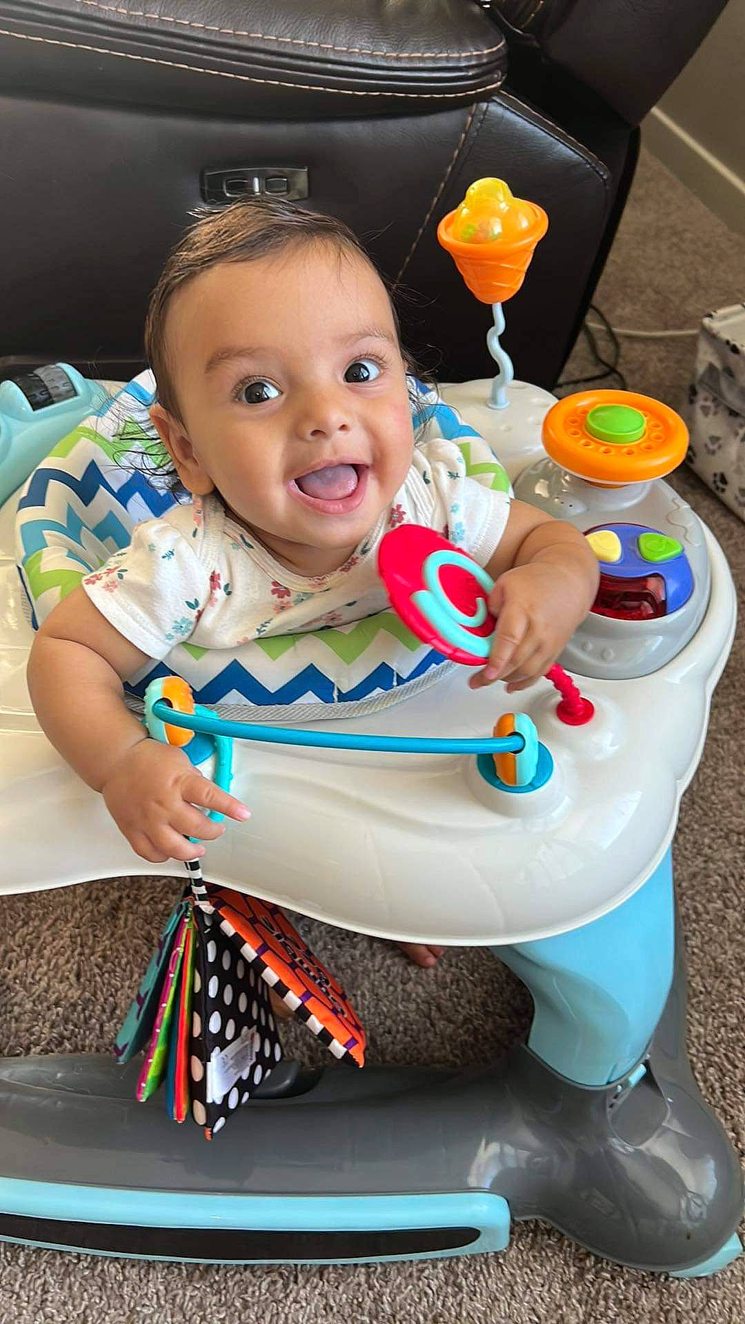 Nayla is registered to the contest to win money with this photo: baby, baby_products, baby_toddler_clothing, baby_toys, child, event, fun, happy, head, icing, orange, party_supply, person, play, sitting, smile, sweetness, toddler, toy, toy_vehicle