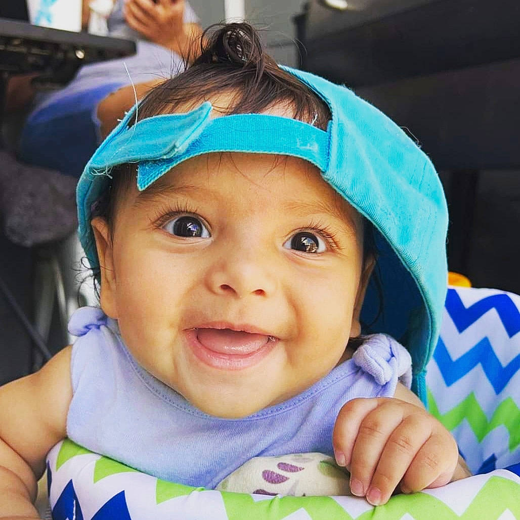 Nayla joined the competition — help win amazing prizes! azure, blue, cheek, chin, ear, eyebrow, eyelash, facial_expression, green, happy, head, headwear, joy, lip, mouth, nose, person, photograph, product, skin