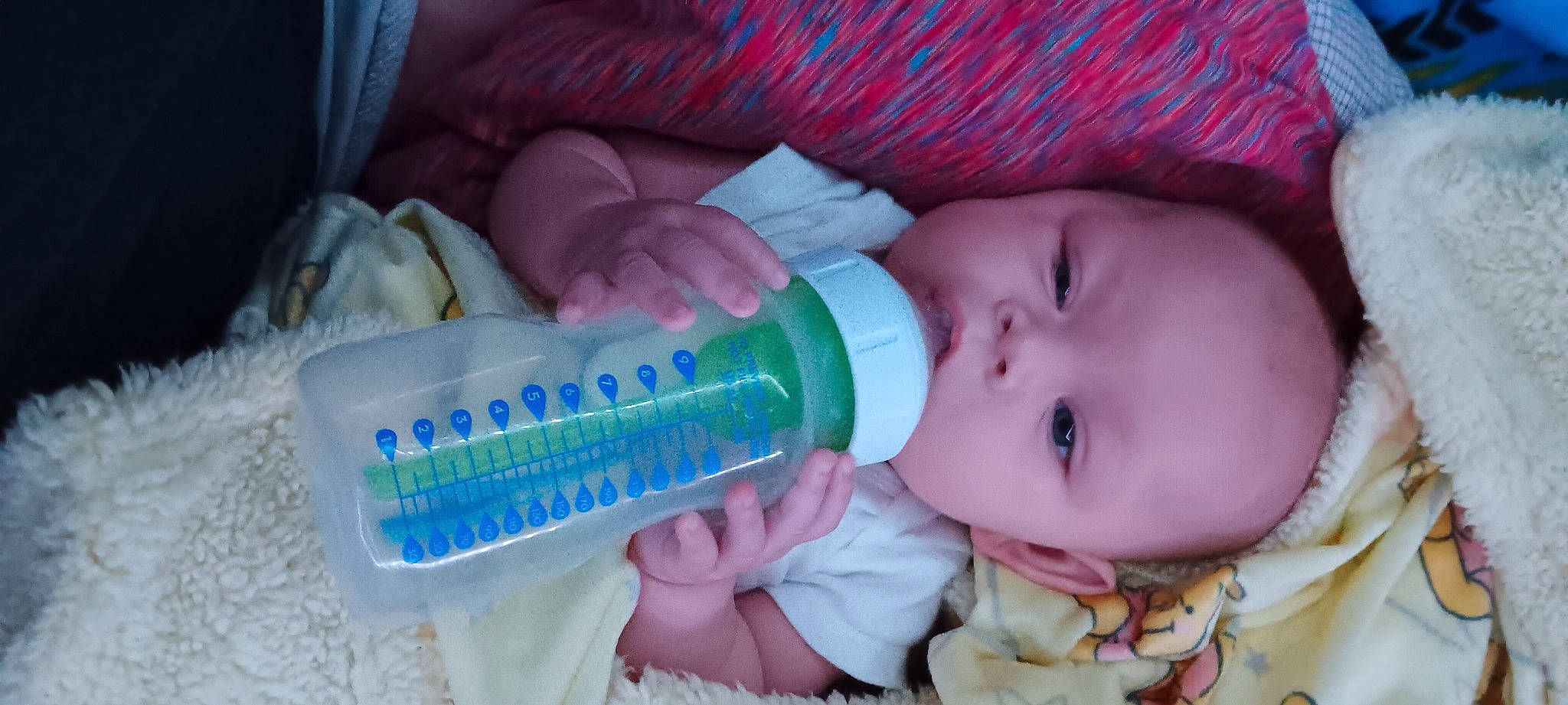 Wrenleigh is registered to the contest to win money with this photo: baby, baby_bottle, baby_products, baby_toddler_clothing, bottle, cheek, child, drinkware, finger, fluid, happy, iris, lip, nail, person, plastic, plastic_bottle, product, skin, toddler