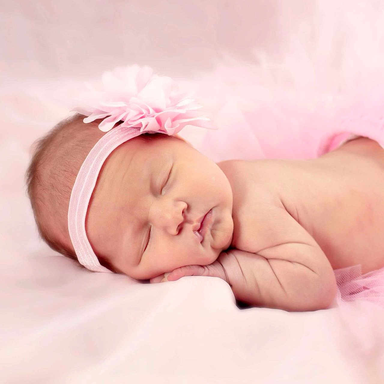 Adaline is registered to the contest to win money with this photo: adorable, baby, babywear, blanket, child, closeup, cute, flower, headband, infant, newborn, peaceful, pink, portrait, resting, skin, sleep, sleeping, soft, tutu