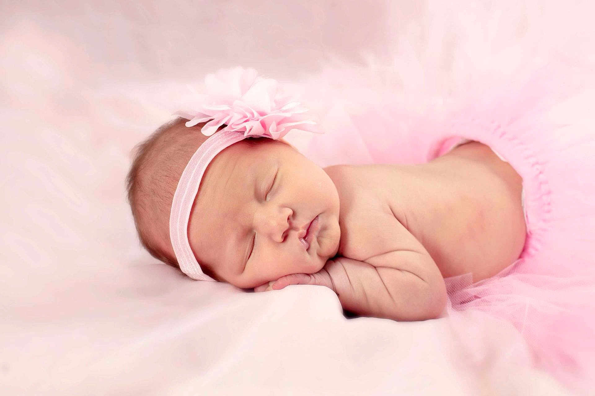 Adaline is registered to the contest to win money with this photo: baby, newborn, sleeping, pink, headband, flower, tutu, soft, blanket, cute, infant, peaceful, resting, portrait, skin, child, sleep, closeup, adorable, babywear