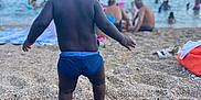 Malick a rejoint le concours — aidez-le/la à gagner de superbes lots ! back_view, barefoot, beach, boats, child, family, holiday, outdoor, pebbles, people, relaxation, sand, sea, shore, sky, summer, swimwear, toddler, vacation, water