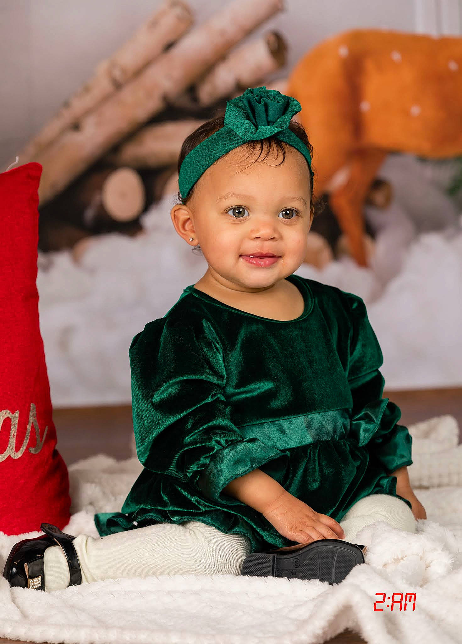 Alora is registered to the contest to win money with this photo: baby, baby_toddler_clothing, child, christmas, event, fictional_character, fun, green, happy, head, headgear, headpiece, holiday, jewellery, joy, leisure, person, pink, skin, sleeve