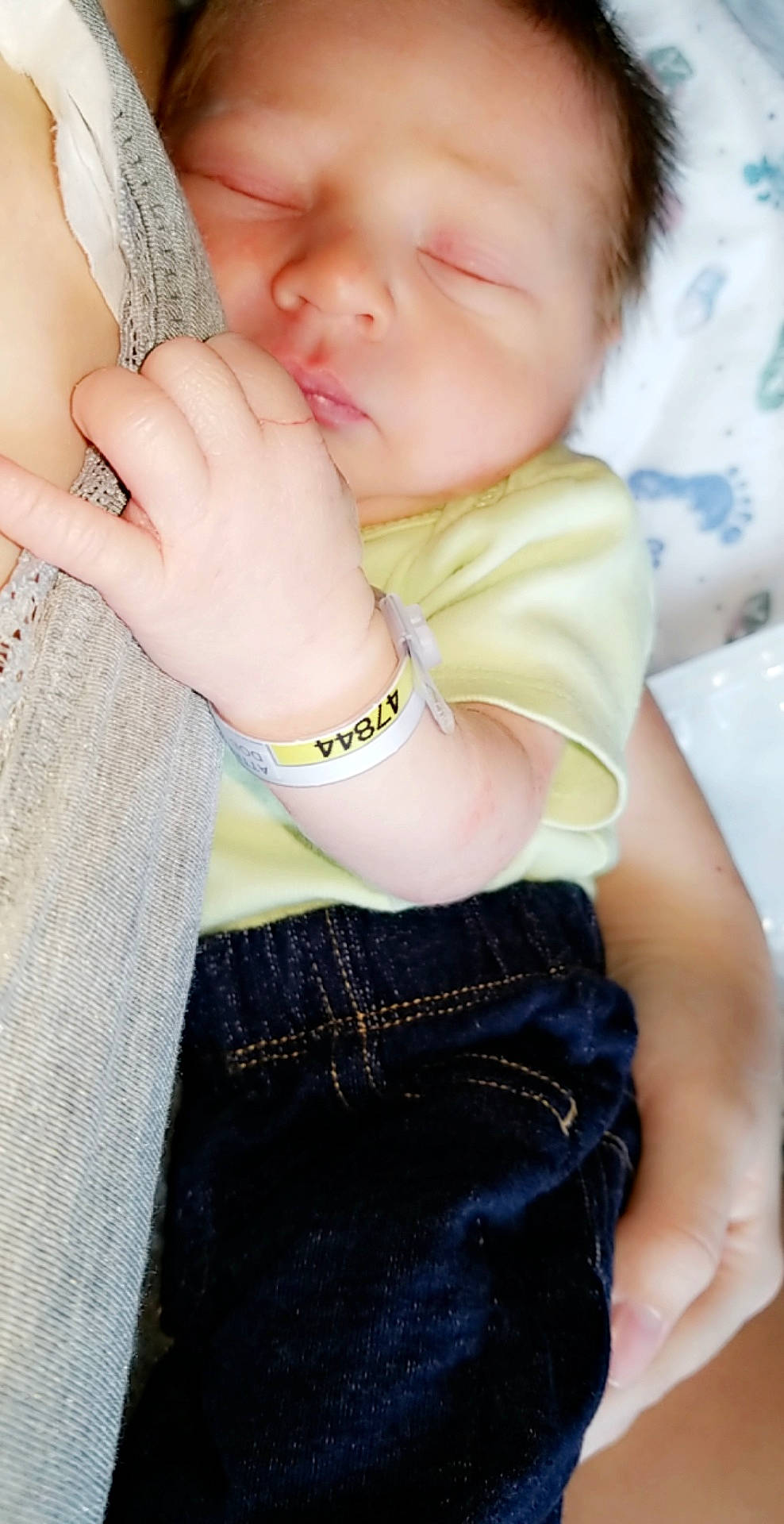 Jaxsyn is registered to the contest to win money with this photo: arm, cheek, child, eye, finger, gesture, hand, nail, person, skin, thumb, toddler
