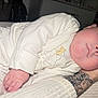 baby, sleeping, infant, pajamas, hand, tattoo, closeup, cozy, peaceful, resting, cute, child, soft, skin, portrait, indoor, warm, comfort, person, newborn