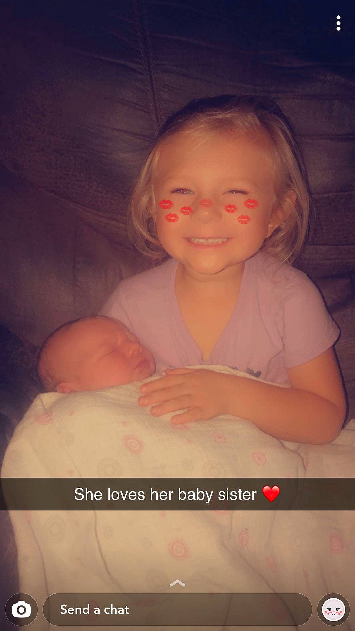 Kyleigh joined the competition — help win amazing prizes! arm, baby, cheek, child, face, facial_expression, finger, head, iris, joy, lip, mouth, nose, person, photo_caption, photography, portrait, sitting, skin, smile