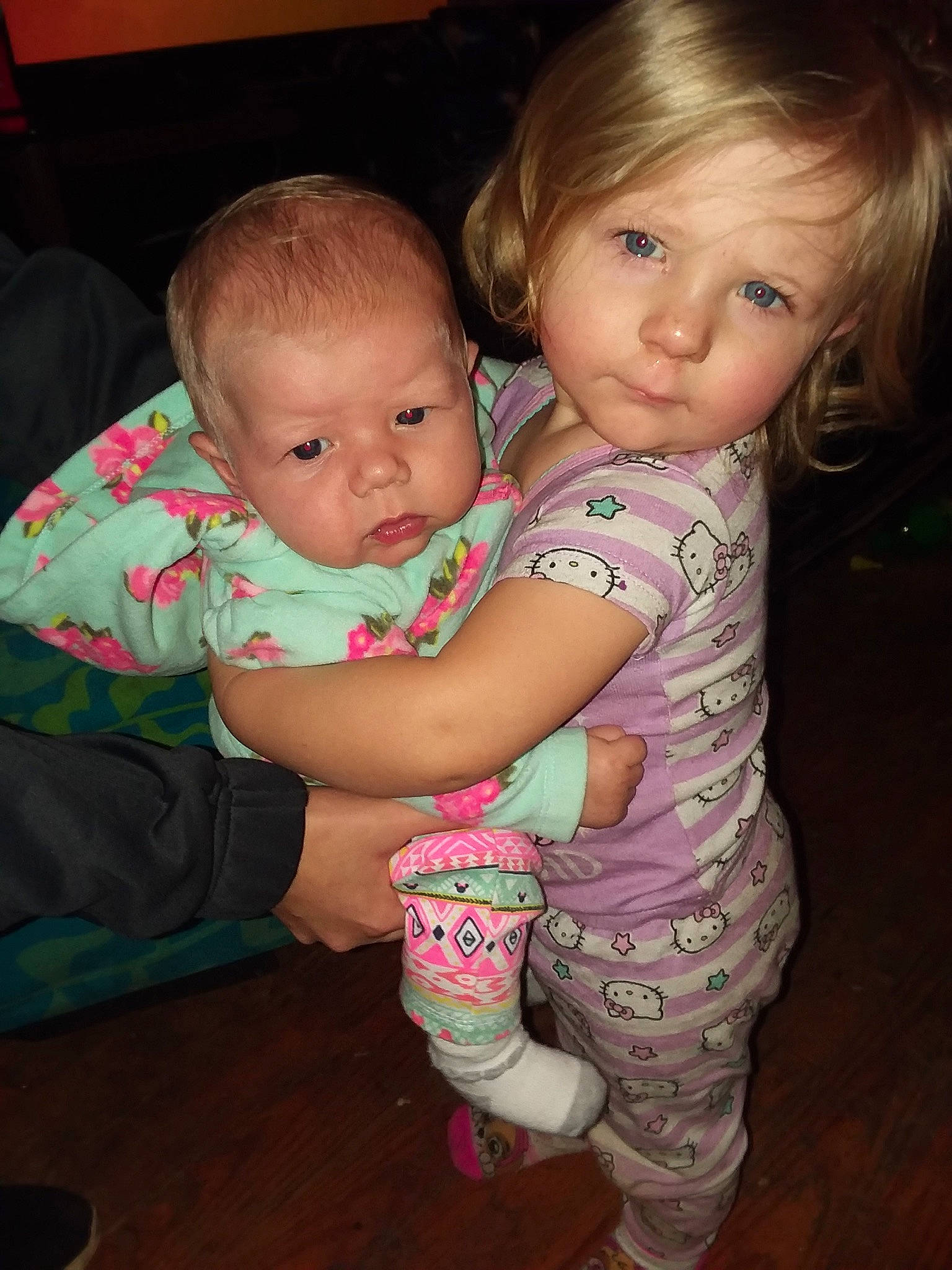 Kyleigh is registered to the contest to win money with this photo: cheek, child, daughter, day, eye, fun, girl, hair, head, human_hair_color, infant, iris, person, pink, play, product, sitting, skin, smile, toddler