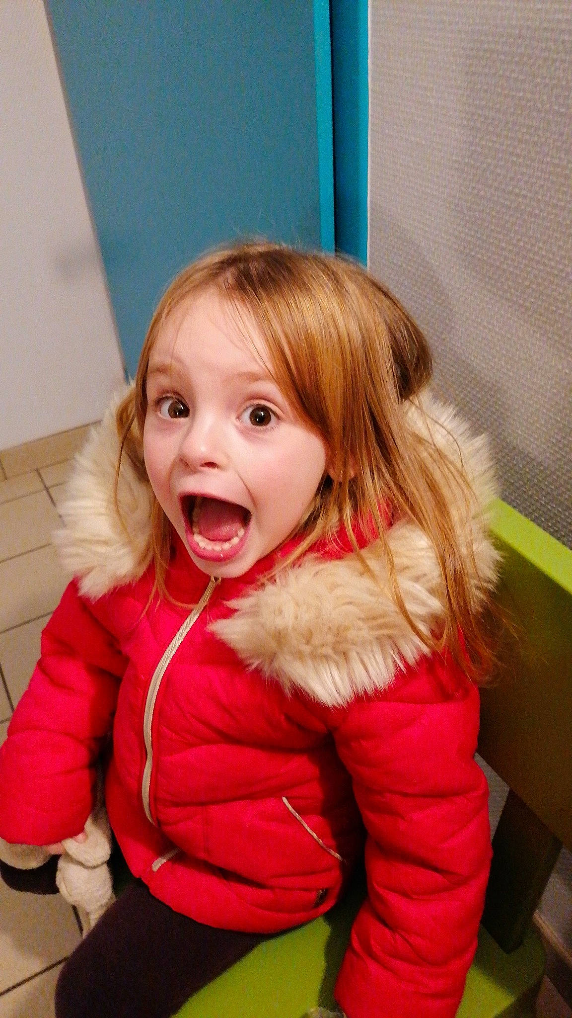 Adele participe au concours pour gagner de l'argent avec cette photo : baby_toddler_clothing, blond, brown_hair, cheek, child, face, facial_expression, fun, fur_clothing, gesture, happy, human_body, iris, jacket, lip, nose, person, pink, skin, smile