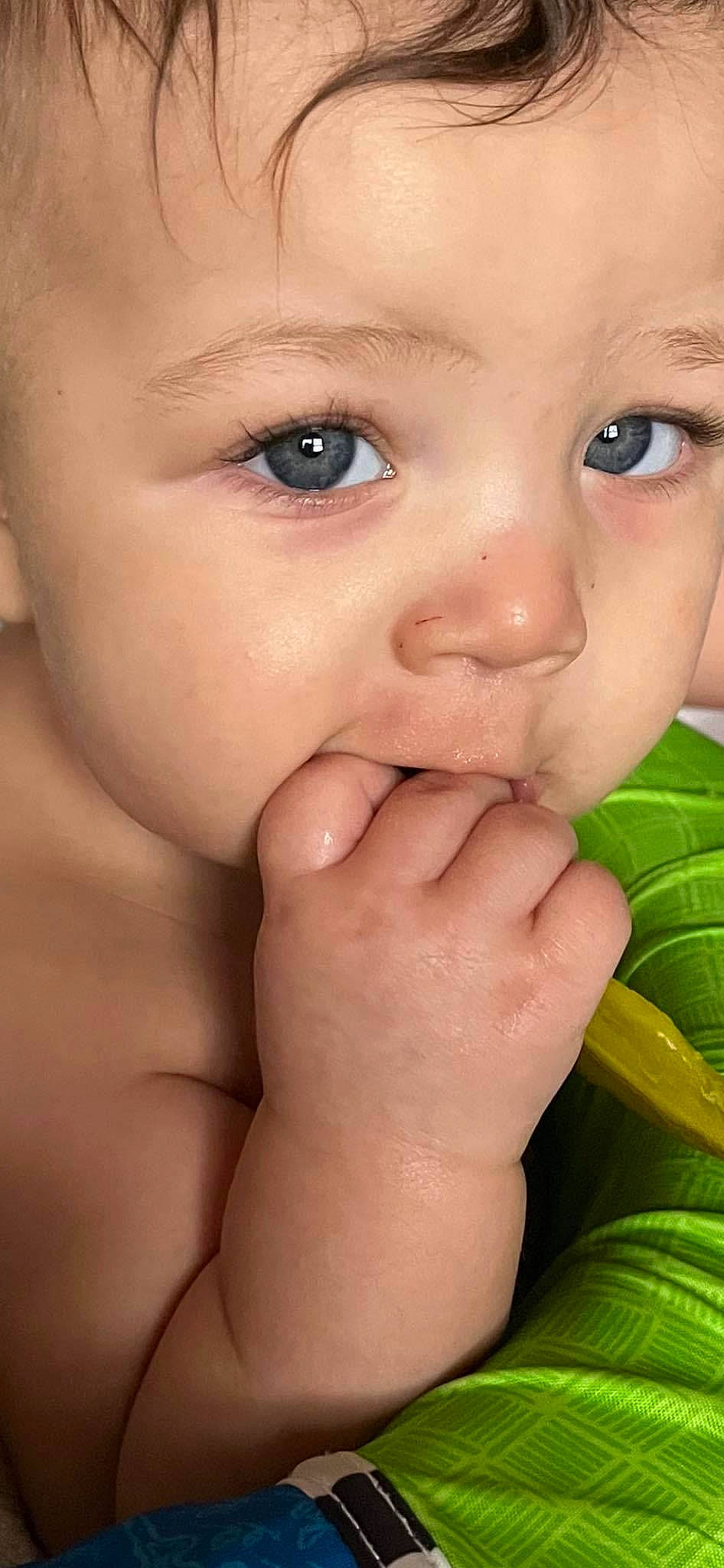 Junior is registered to the contest to win money with this photo: arm, baby, cheek, close_up, ear, eyelash, finger, gesture, hand, happy, iris, lip, mouth, nail, neck, nose, person, skin, smile, thumb