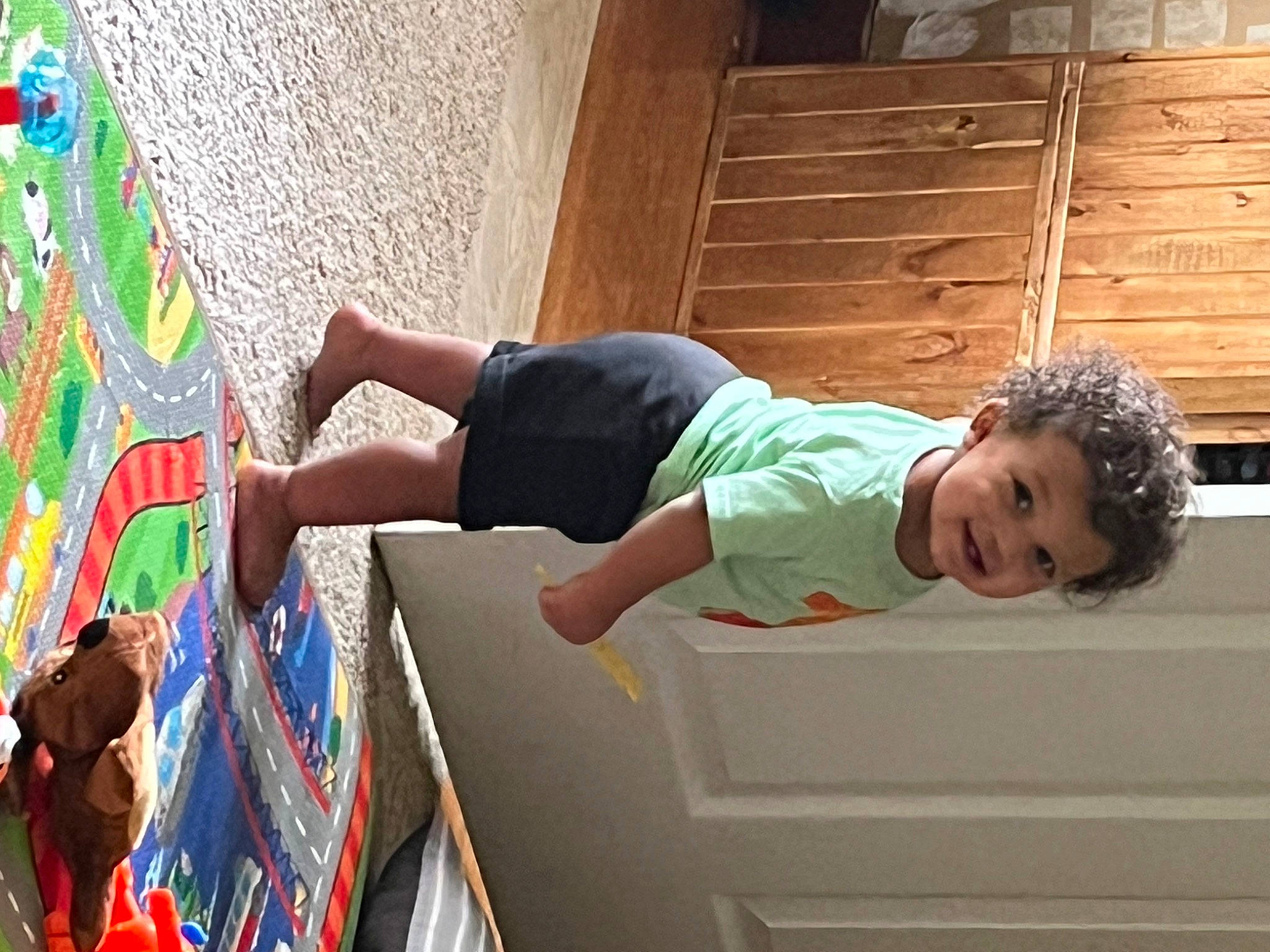 Braylon is registered to the contest to win money with this photo: adventure, art, artist, child, fun, hardwood, human_leg, leisure, paint, painter, painting, person, recreation, room, shorts, t_shirt, thigh, toddler, visual_arts, wood
