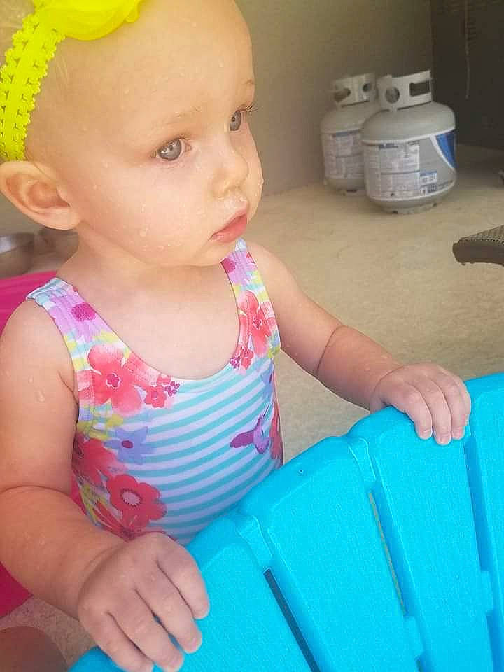 Tayler joined the competition — help win amazing prizes! baby, baby_toddler_clothing, blue, cheek, clothing, eye, facial_expression, finger, green, hairstyle, happy, human_body, iris, mouth, nose, organ, person, pink, skin, standing