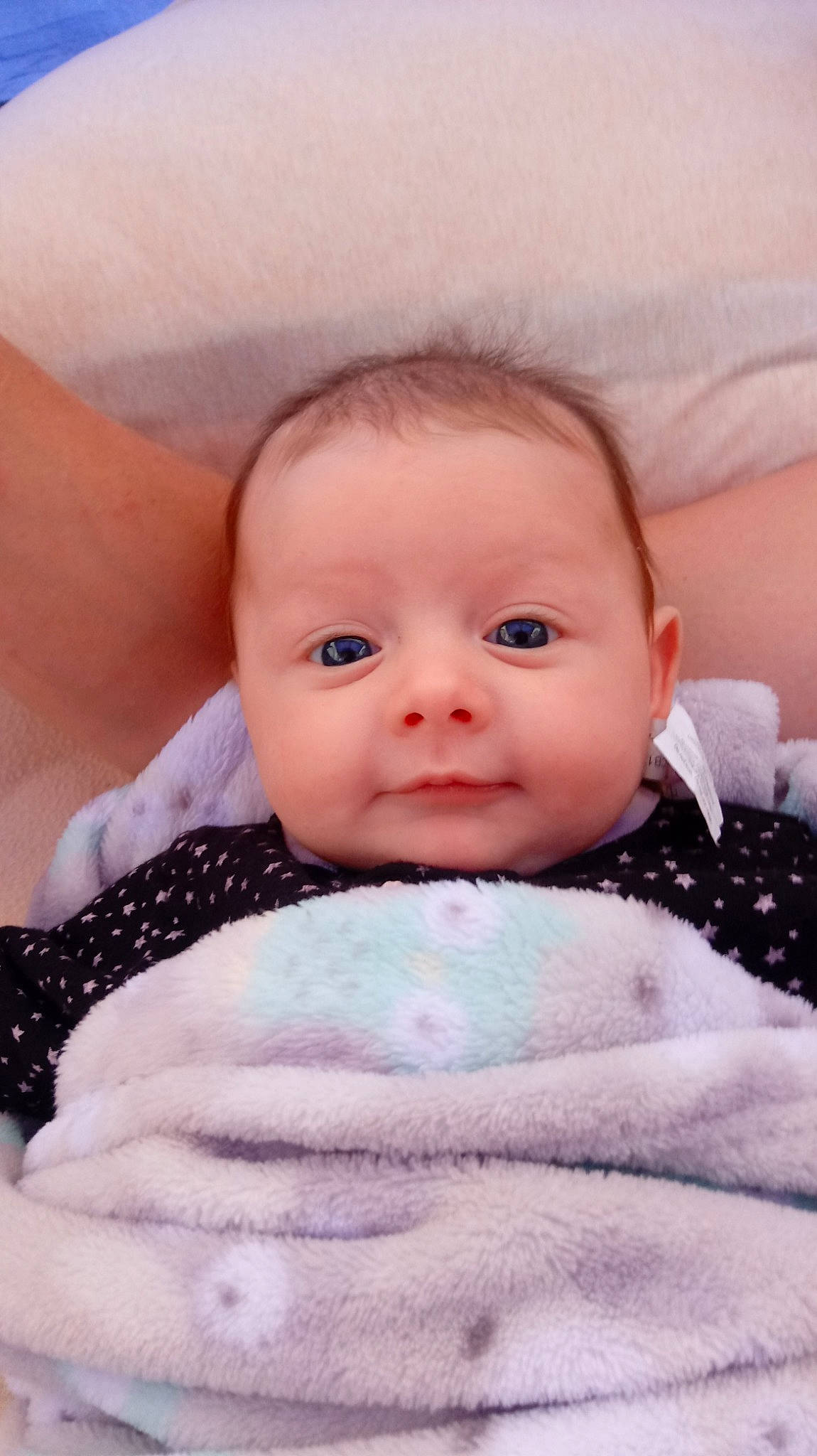 Reina is registered to the contest to win money with this photo: baby, beauty, cheek, child, chin, close_up, eye, eyebrow, face, head, iris, lip, mouth, nose, person, pink, skin, smile, toddler