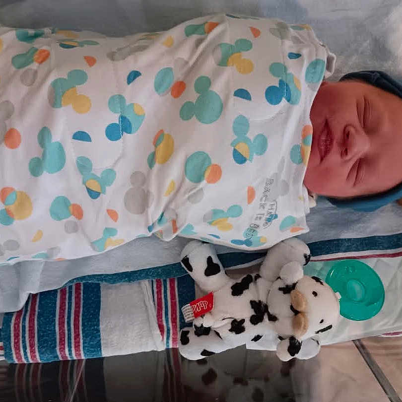 Corbyn is registered to the contest to win money with this photo: architecture, baby, blanket, building, childbirth, crying, cushion, face, happy, head, homedecor, hospital, infantbed, newborn, person, sad, sleeping, teddybear, toy, yawning