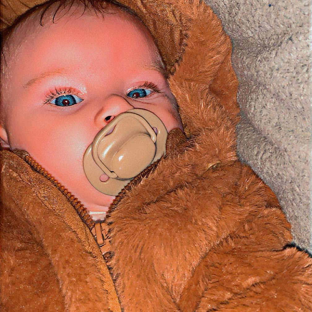 Luna joined the competition — help win amazing prizes! baby, blanket, bodypart, clothing, coat, face, finger, hat, head, hood, hoodie, jacket, knitwear, newborn, person, photography, portrait, quilt, sweater, sweatshirt
