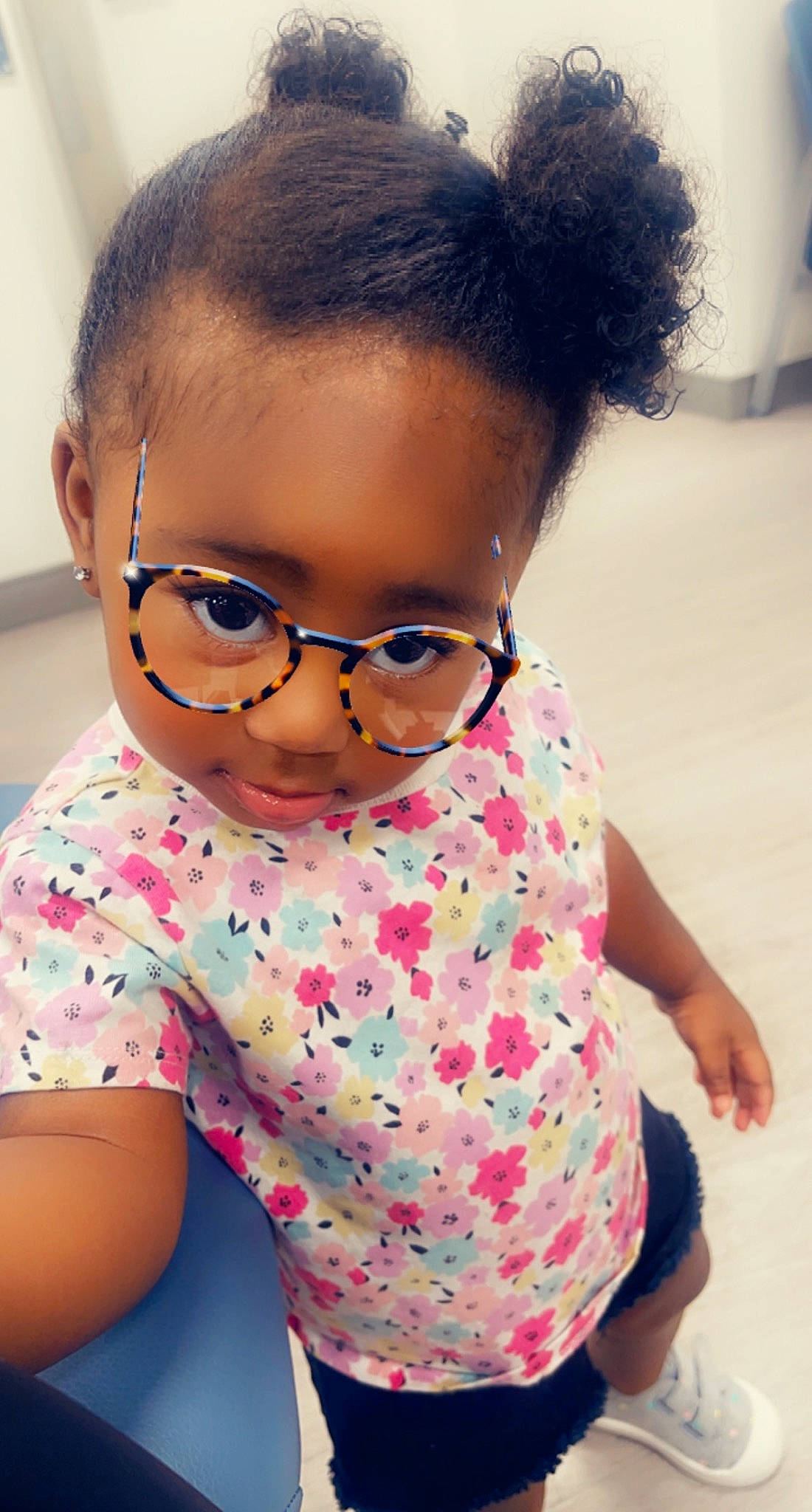 Royalty is registered to the contest to win money with this photo: arm, baby_toddler_clothing, cheek, chin, eye, eyelash, eyewear, face, hair, happy, head, human, lip, neck, nose, organ, person, pink, skin, sleeve