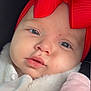 Naëlya a rejoint le concours — aidez-le/la à gagner de superbes lots ! baby, close_up, face, headband, red_bow, clothing, pink, white, fur, infant, cute, portrait, child, soft_lighting, expression, young, skin, eyes, warm, adorable