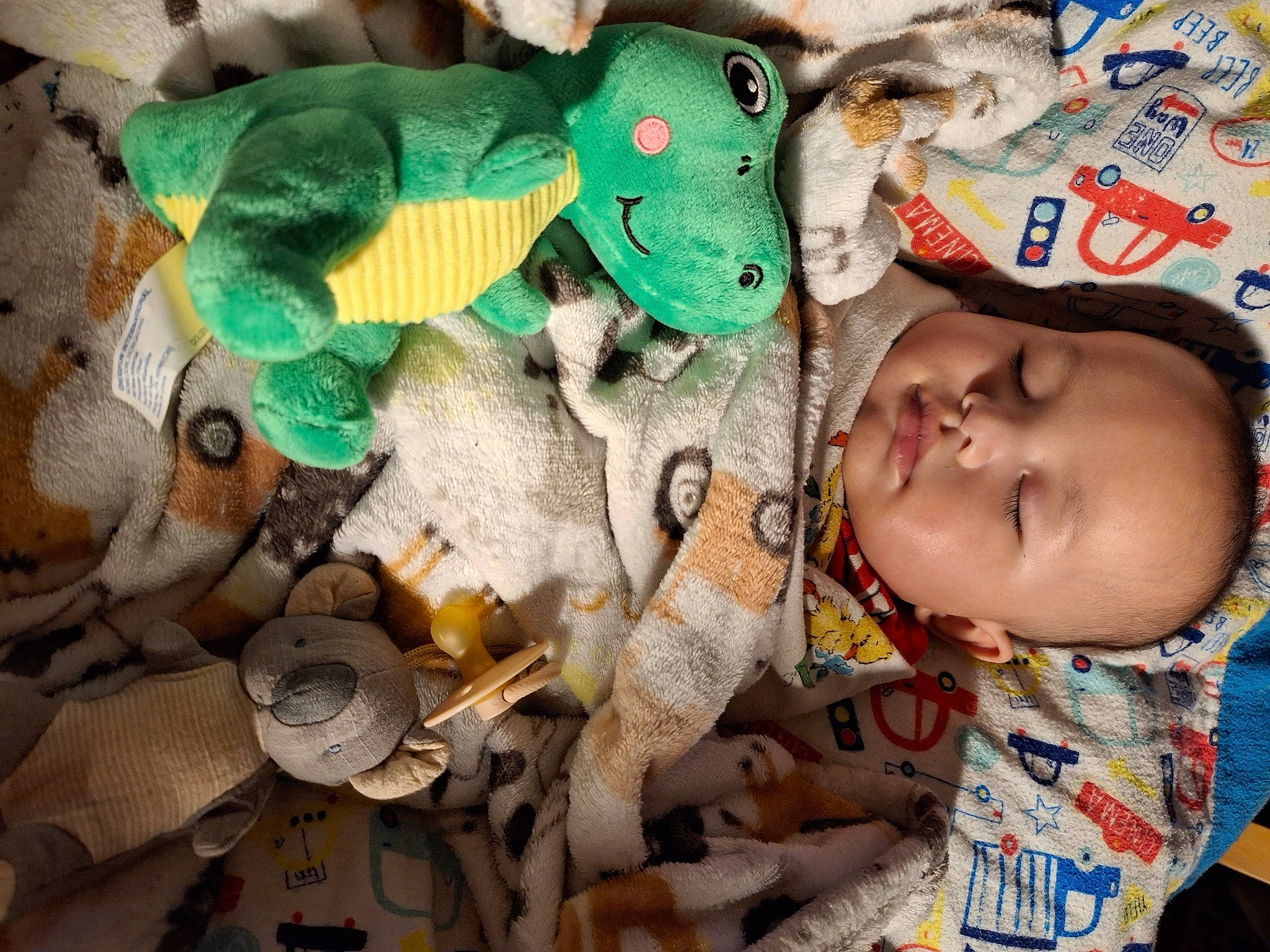 Joshua Jr is registered to the contest to win money with this photo: art, baby, baby_products, baby_toddler_clothing, baby_toys, child, collection, fashion_accessory, linens, pattern, person, plastic, plush, room, stuffed_toy, textile, toddler, toy, visual_arts, wood