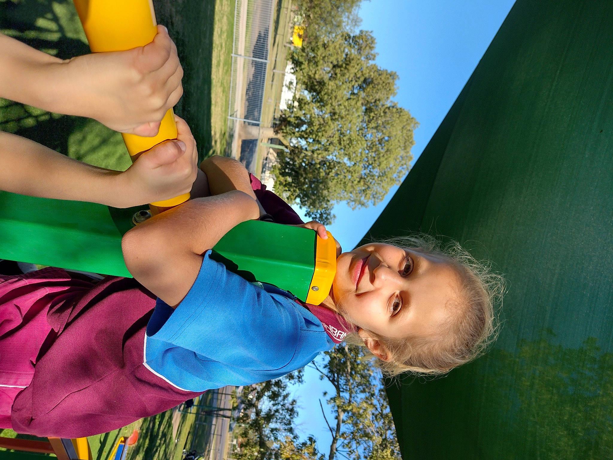 Meagan is registered to the contest to win money with this photo: child, electric_blue, event, fun, grass, happy, human_leg, joy, knee, leisure, people_in_nature, person, recreation, sky, thigh, tree, yellow