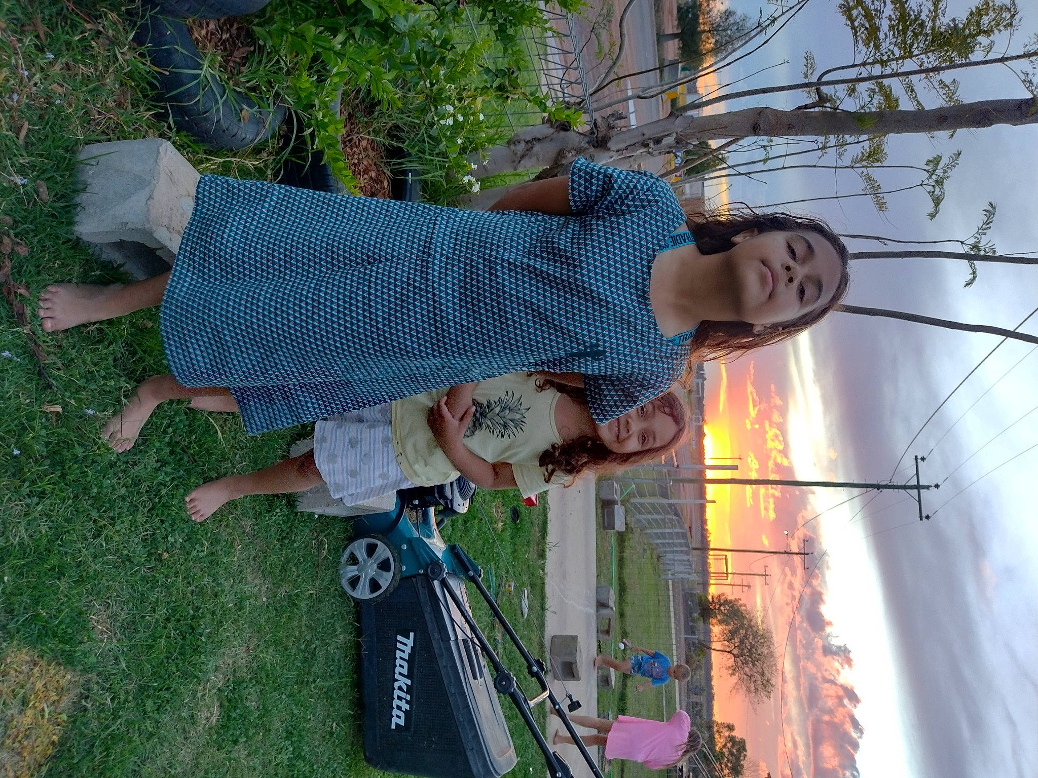 Harmony is registered to the contest to win money with this photo: cloud, electrical_supply, electricity, fun, grass, joy, leisure, overhead_power_line, pattern, person, plant, pole, public_utility, recreation, sky, t_shirt, tree, wire