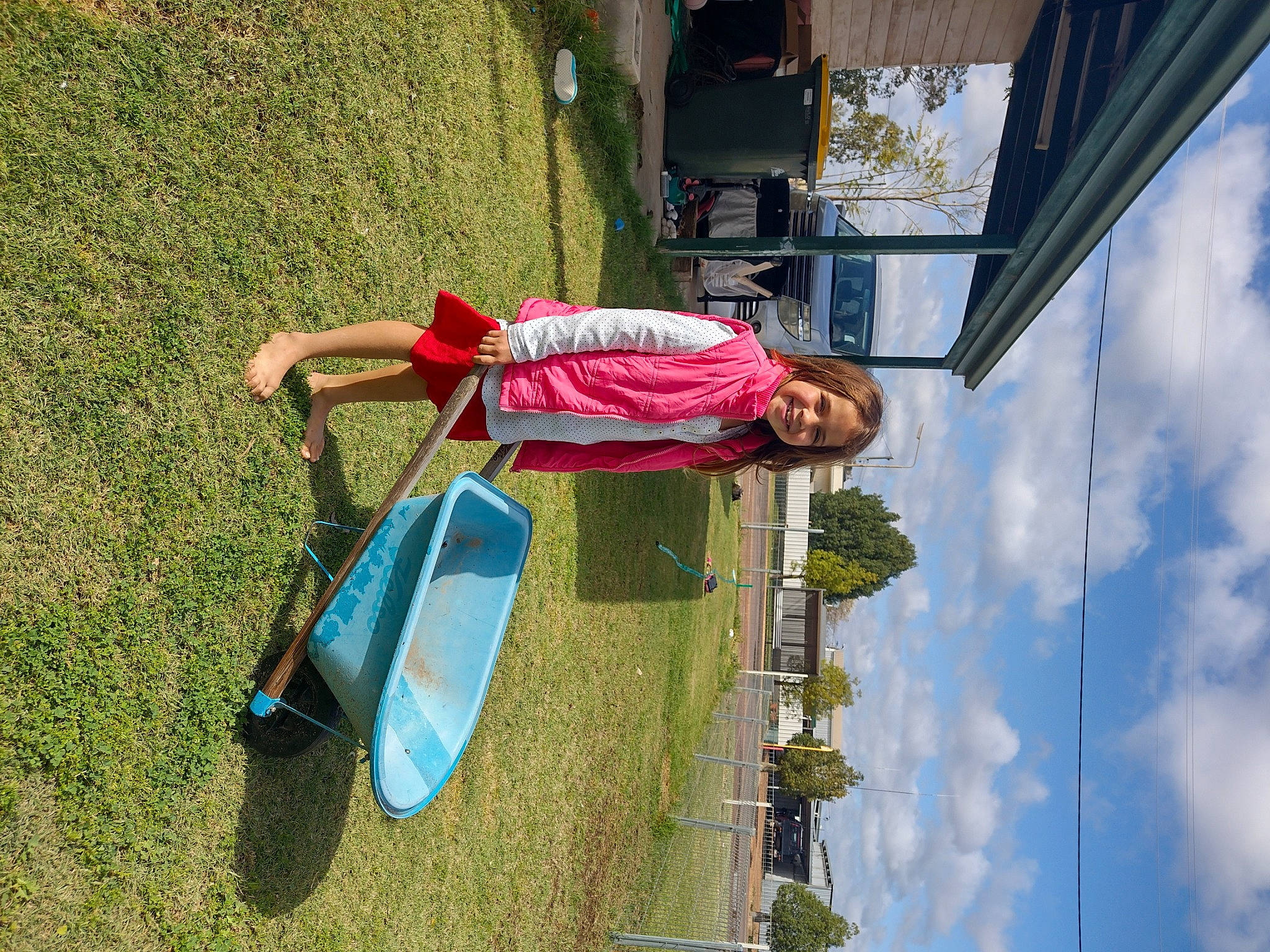 Charley is registered to the contest to win money with this photo: adventure, boats_and_boating_equipment_and_supplies, city, cloud, fun, grass, joy, landscape, leisure, magenta, people_in_nature, person, plant, pole, recreation, sky, tire, toddler, travel, tree