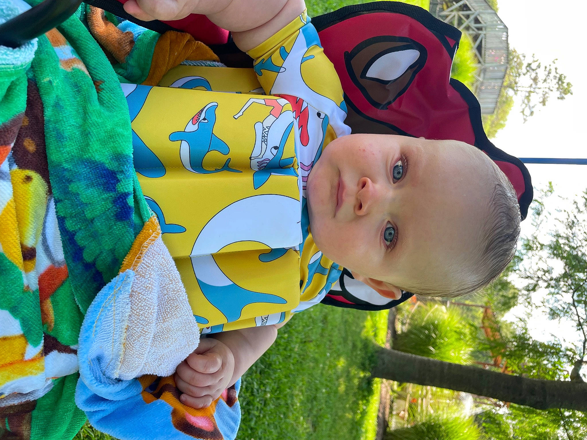 Mason is registered to the contest to win money with this photo: baby, baby_products, baby_toddler_clothing, child, fun, grass, green, happy, hat, leisure, people_in_nature, person, photograph, plant, recreation, skin, sky, toddler, toy, tree