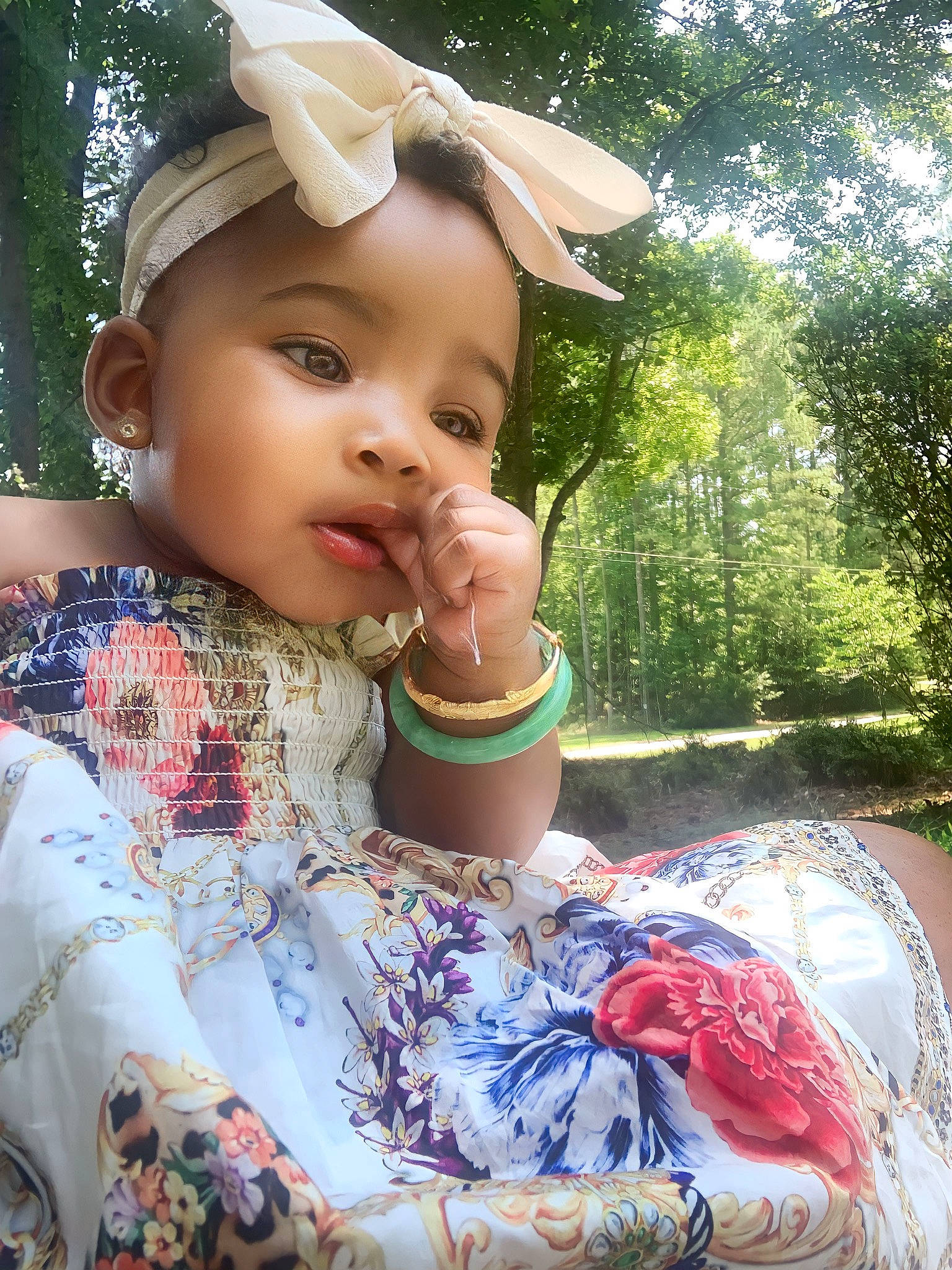 Fallon joined the competition — help win amazing prizes! baby, baby_toddler_clothing, cap, child, event, face, fashion_accessory, fun, grass, happy, hat, headgear, leisure, person, plant, recreation, sitting, sleeve, summer, toddler
