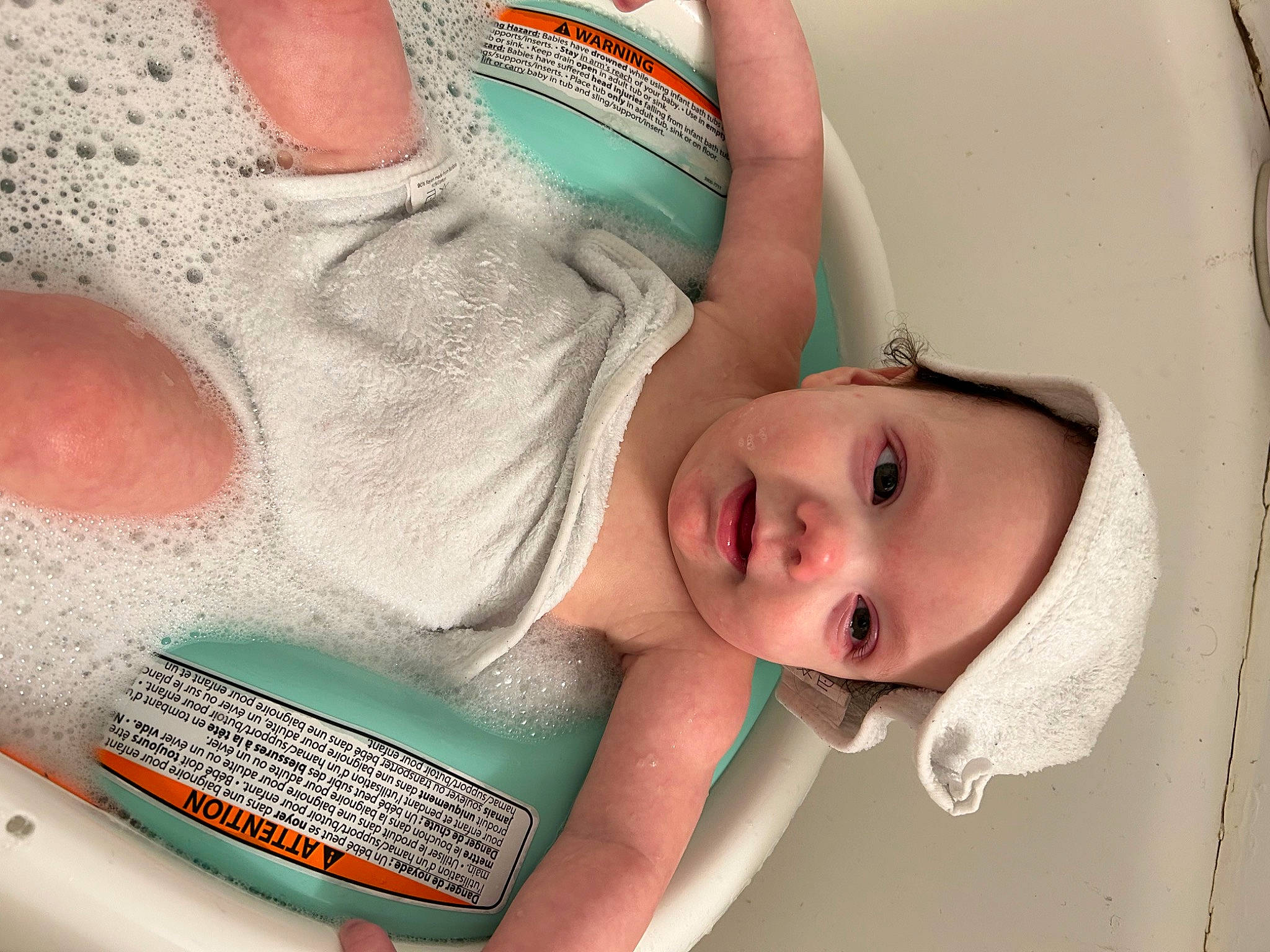 Lorelei is registered to the contest to win money with this photo: arm, baby, baby_safety, baby_toddler_clothing, cheek, chest, chin, comfort, eyebrow, eyelash, finger, hand, happy, headwear, iris, lip, mouth, nail, nose, person