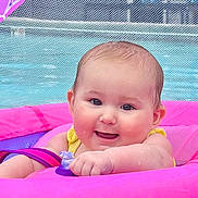 Violet joined the competition — help win amazing prizes! baby, canopy, child, cute, face, float, happy, infant, inflatable_ring, mesh_fence, outdoor, pink, playful, pool, smiling, summer, swimming, water, water_reflection, yellow_clothing
