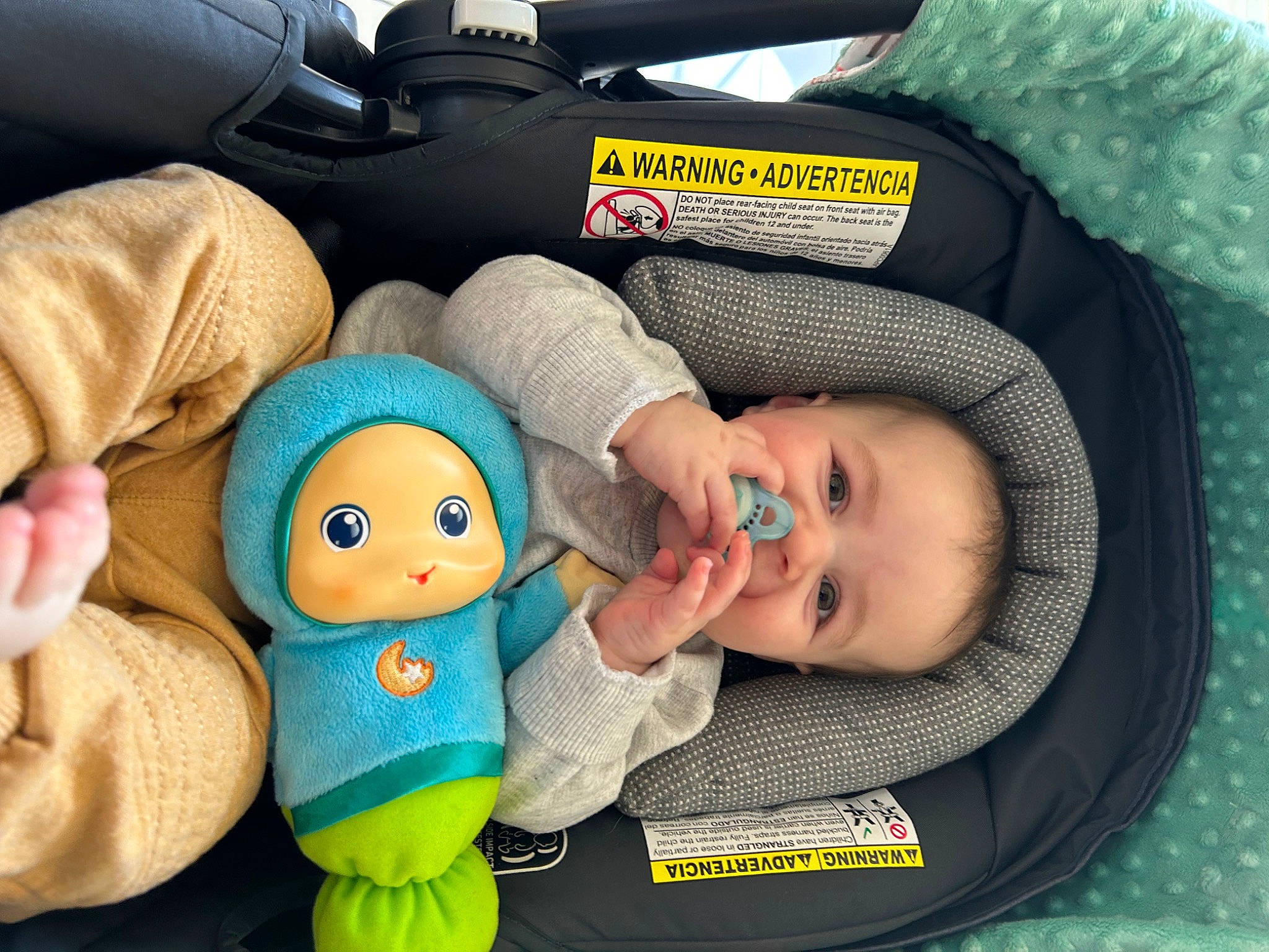 Braxton is registered to the contest to win money with this photo: auto_part, baby, baby_carriage, baby_in_car_seat, baby_products, baby_safety, baby_sleeping, baby_toddler_clothing, car_seat, child, comfort, finger, hand, person, service, smile, stuffed_toy, thumb, toddler, toy