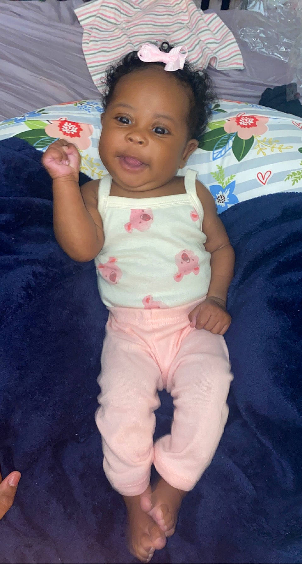 Kensley is registered to the contest to win money with this photo: baby, baby_toddler_clothing, beauty, cheek, child, eye, face, finger, fun, gesture, happy, human, linens, person, pink, skin, sleeve, smile, t_shirt, thumb