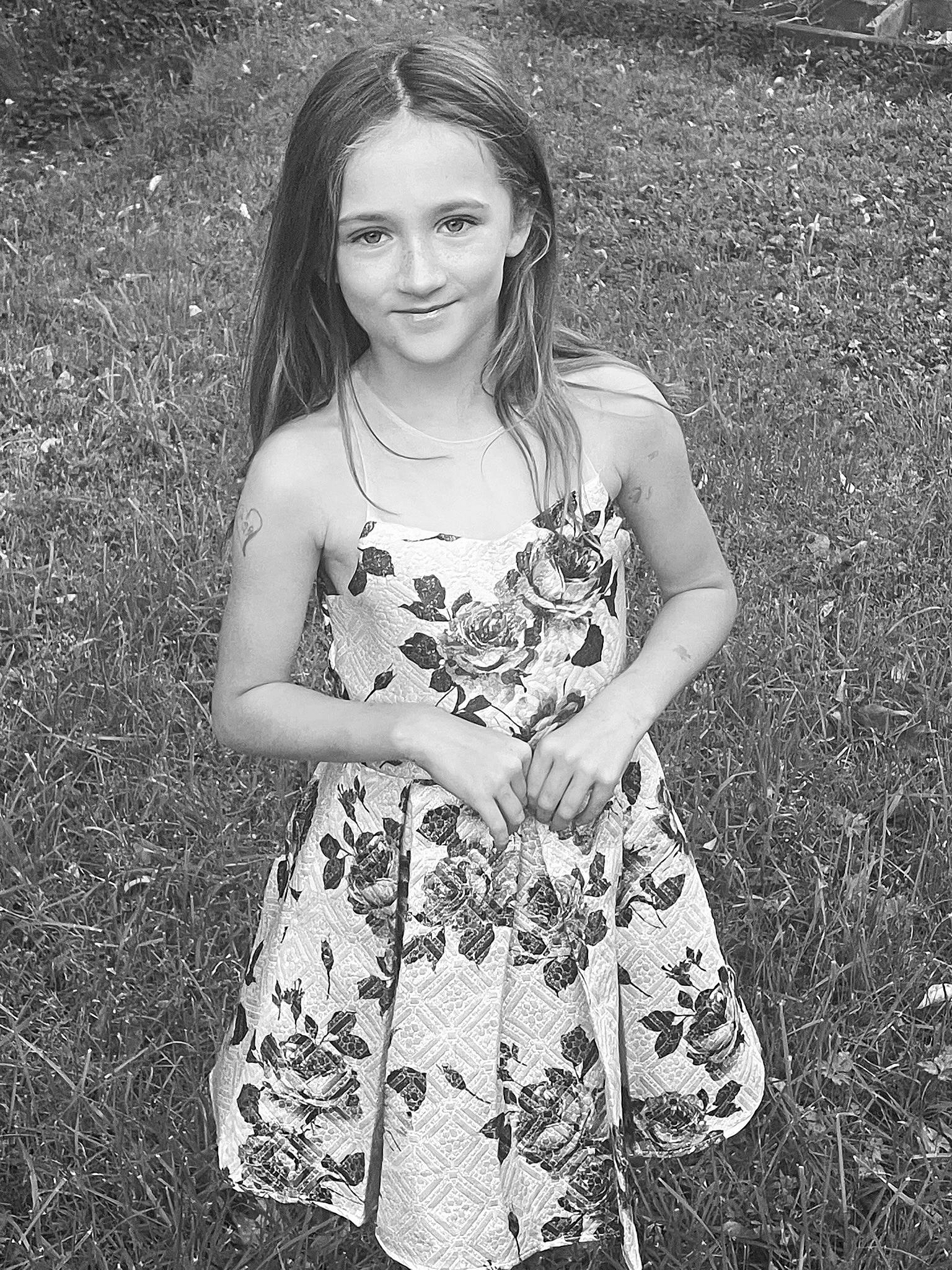 Aubrey joined the competition — help win amazing prizes! black_and_white, day_dress, dress, eye, facial_expression, flash_photography, fun, grass, hairstyle, happy, human, joy, monochrome, one_piece_garment, people_in_nature, person, plant, smile, standing, style