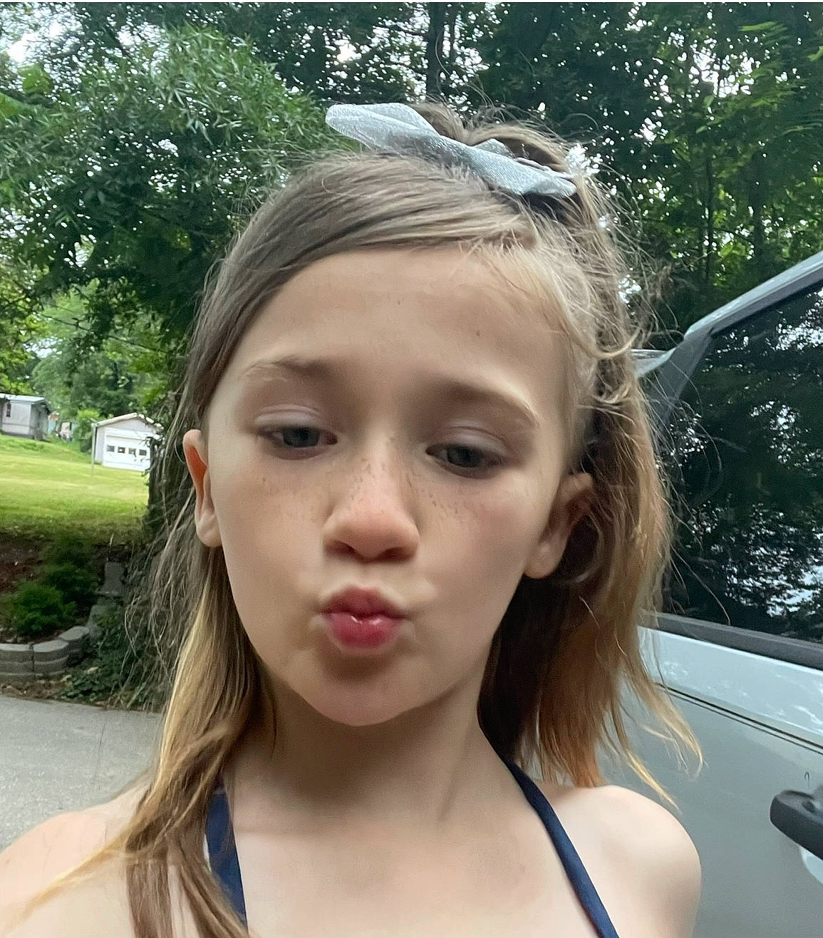 Aubrey is registered to the contest to win money with this photo: bangs, cool, ear, eyebrow, eyelash, eyewear, facial_expression, fashion, forehead, grass, happy, headpiece, hood, jaw, jewellery, lip, long_hair, person, plant, summer