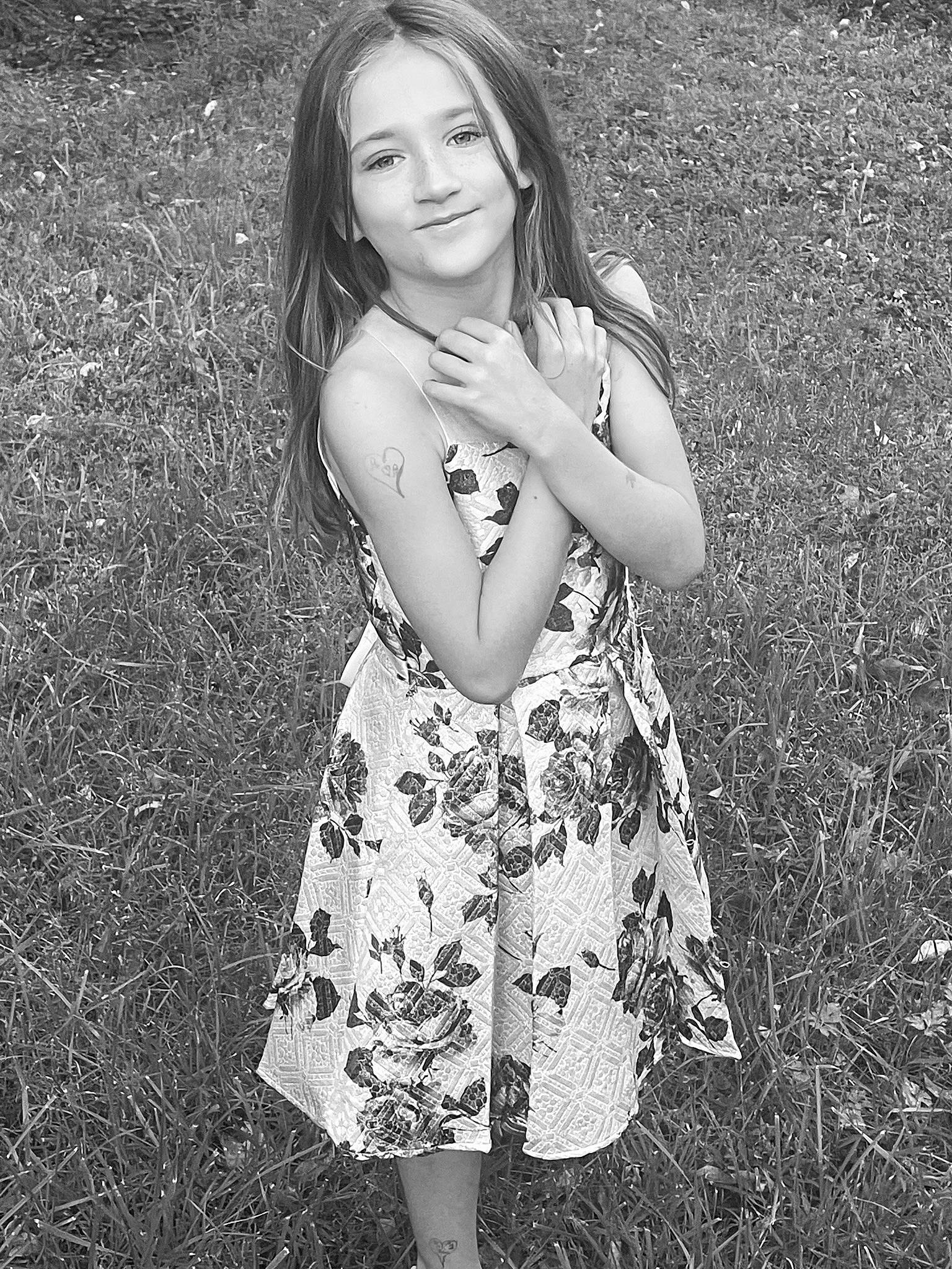 Aubrey joined the competition — help win amazing prizes! black, black_and_white, day_dress, dress, flash_photography, gesture, grass, grass_family, grey, hairstyle, happy, joy, one_piece_garment, people, people_in_nature, person, photograph, plant, smile, standing