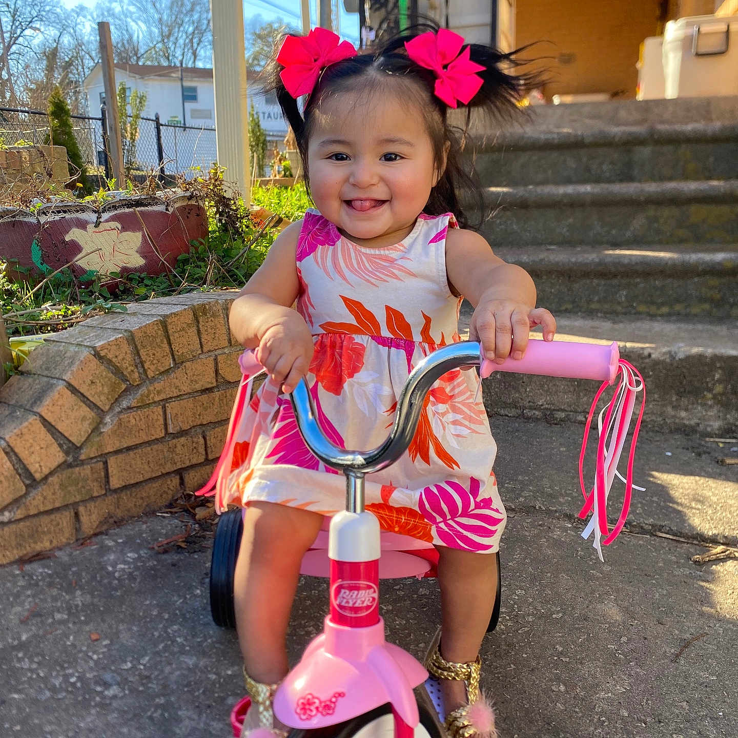 Jaslinn joined the competition — help win amazing prizes! child, city, clothing, dress, face, female, footwear, girl, head, person, photography, plant, portrait, pottedplant, road, sandal, street, transportation, tricycle, urban