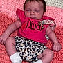 Oakleyy is registered to the contest to win money with this photo: baby, sleeping, infant, pink_shirt, leopard_print, socks, crocheted_blanket, hand, face, clothing, cute, resting, indoor, newborn, person, soft_texture, pattern, cozy, small, peaceful