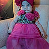 Oakleyy is registered to the contest to win money with this photo: armchair, baby, bow, child, colorful, curious, cute, fashion, furniture, happy, headwear, indoor, infant, person, pink_dress, plush, portrait, seated, small_person, soft_lighting