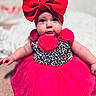 adorable, baby, cheeks, child, colorful, cute, fashion, fluffy, headband, indoor, infant, patterned_clothing, person, pink_dress, portrait, red_bow, sitting, soft_background, tutu, young