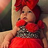 adorable, baby, child, closeup, colorful, curious, cute, expression, face, fashion, headband, indoor, infant, leopard_print, portrait, red_bow, red_dress, sitting, soft_chair, young_child
