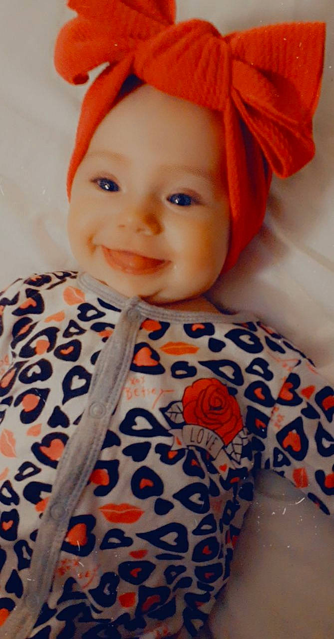 Cassi Rain joined the competition — help win amazing prizes! baby, cheek, child, headwear, joy, orange, person, textile, toddler, toy