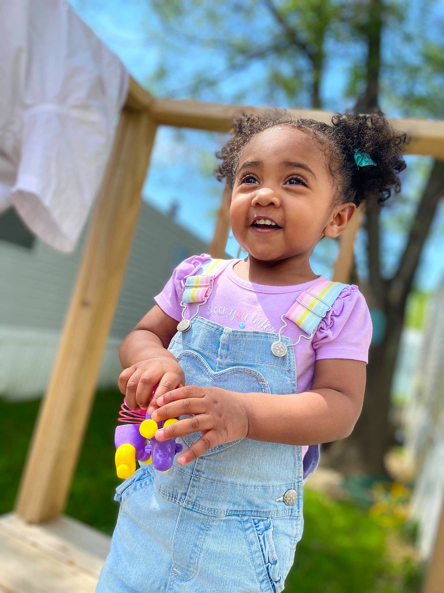 Sky joined the competition — help win amazing prizes! child, face, facial_expression, fun, grass, hair, happy, leaf, leisure, people_in_nature, person, plant, public_space, recreation, skin, sky, smile, summer, toddler, tree