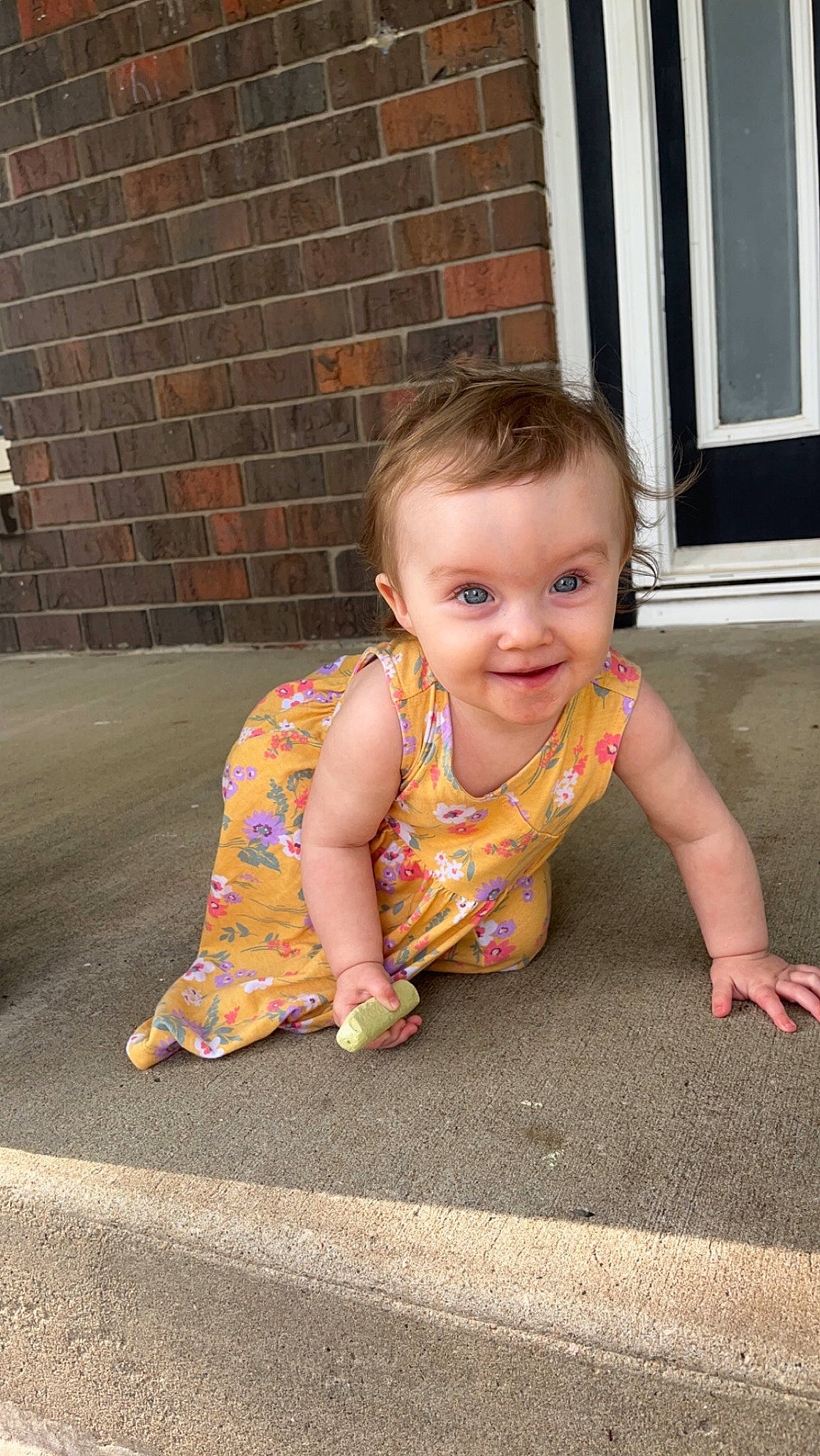 Salia joined the competition — help win amazing prizes! asphalt, baby, baby_toddler_clothing, cheek, chin, crawling, eye, face, facial_expression, floor, flooring, grass, hair, head, joy, person, pink, road_surface, skin, smile