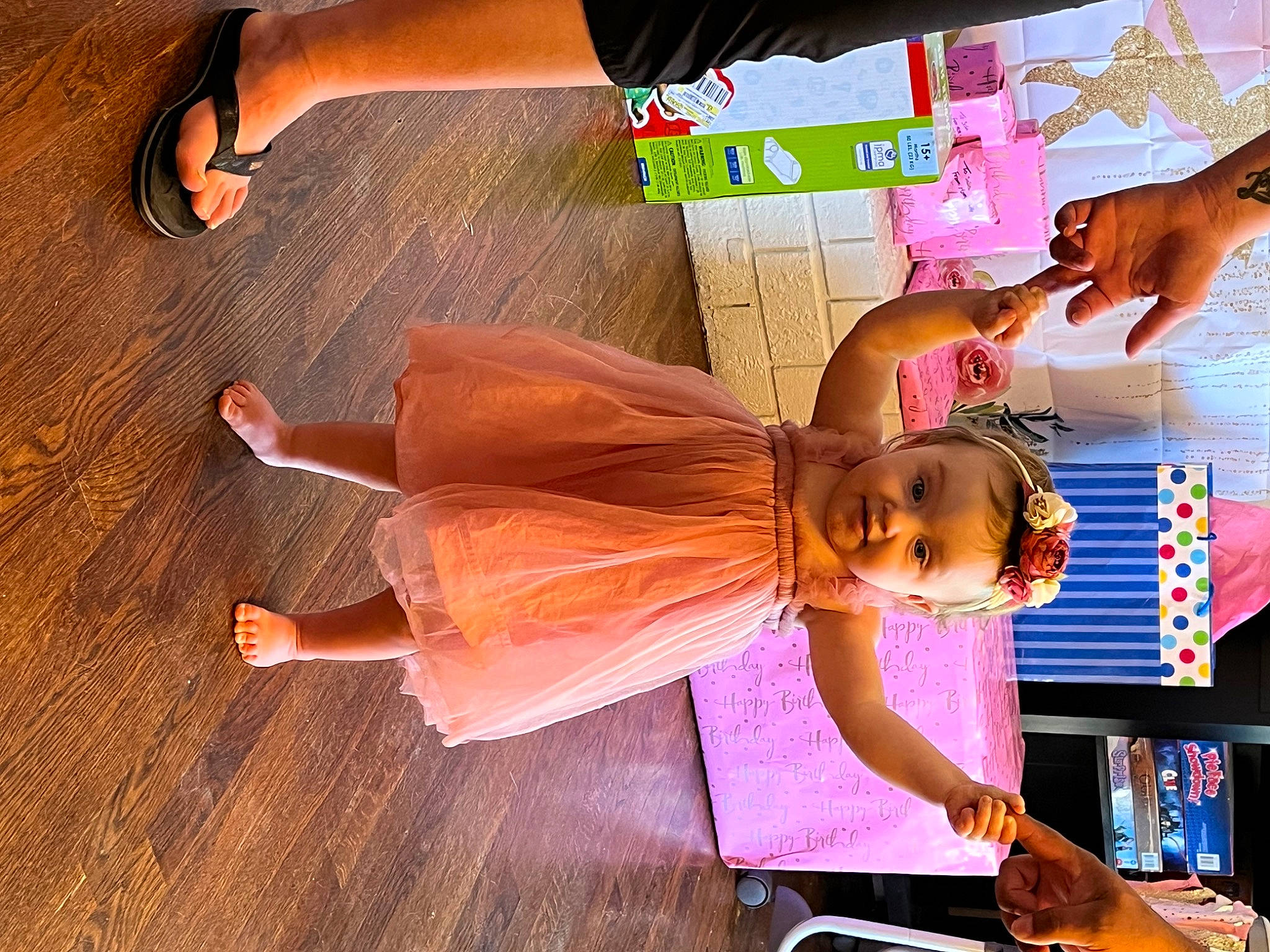 Salia is registered to the contest to win money with this photo: child, eyewear, fashion_design, flooring, foot, fun, happy, hardwood, human_leg, leg, leisure, magenta, pattern, peach, person, pink, sandal, sunglasses, thigh, waist