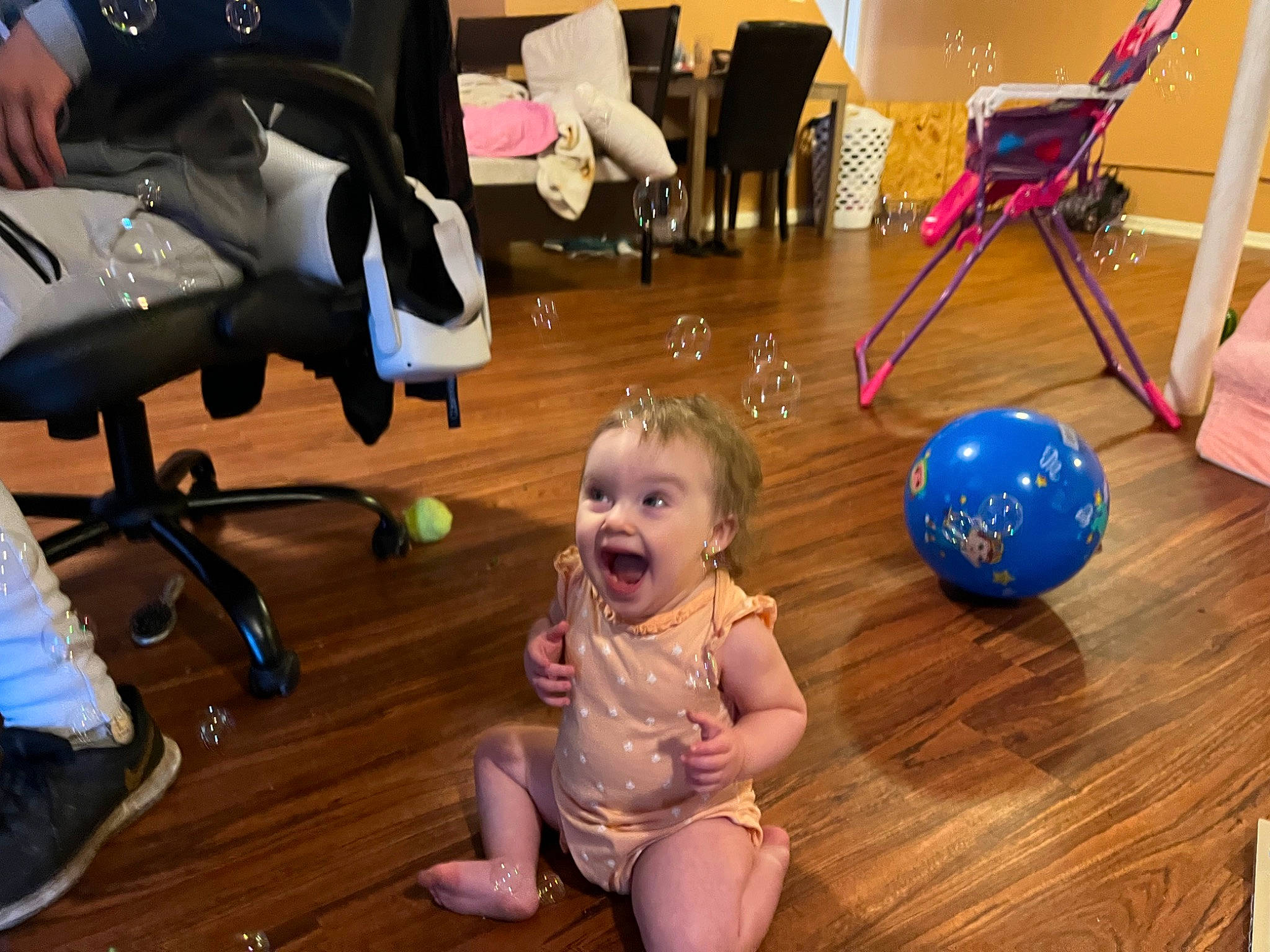 Salia joined the competition — help win amazing prizes! baby, ball, chair, child, event, floor, flooring, fun, happy, hardwood, laminate_flooring, leisure, person, room, sitting, smile, snapshot, surprise, toddler, toy