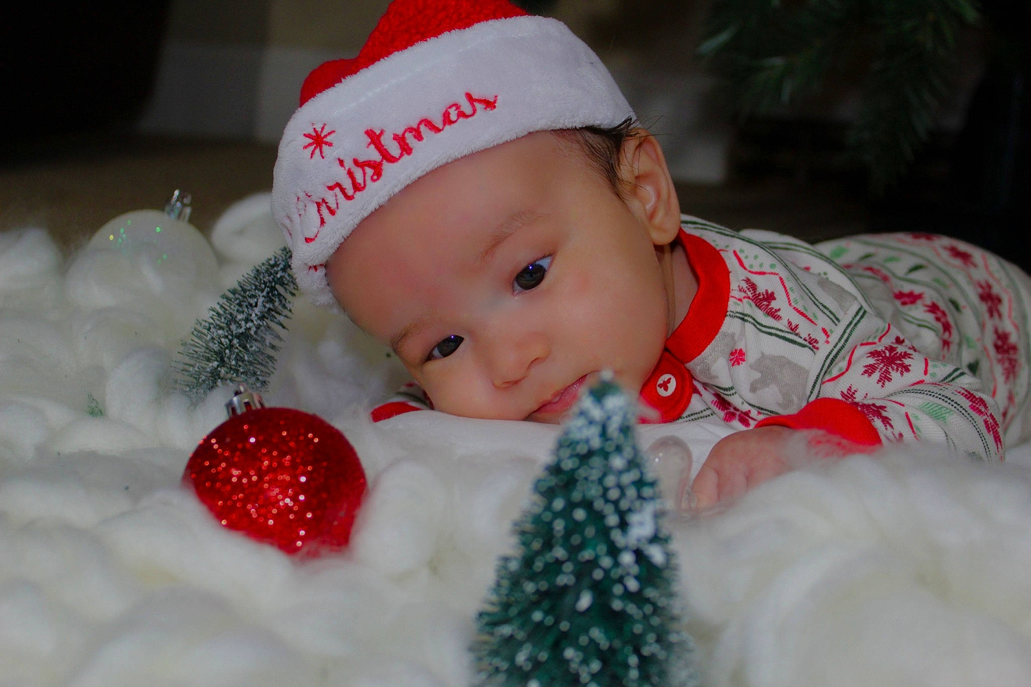 Kaizer joined the competition — help win amazing prizes! baby, baby_toddler_clothing, cap, child, christmas, christmas_eve, close_up, event, eye, facial_expression, fun, happy, head, headgear, headwear, holiday, person, santa_claus, skin, smile