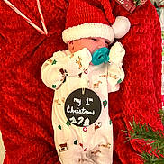 Kaston is registered to the contest to win money with this photo: carmine, christmas, christmas_decoration, christmas_eve, christmas_ornament, christmas_stocking, clock, costume_hat, event, fashion_accessory, fictional_character, font, hat, holiday, holiday_ornament, interior_design, ornament, red, santa_claus, watch